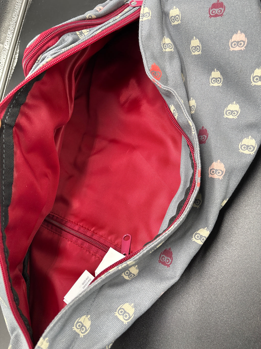 KAVU RETIRED OWL Print crossbody bag New with no Tags interior view showcasing vibrant red lining and owl print design.