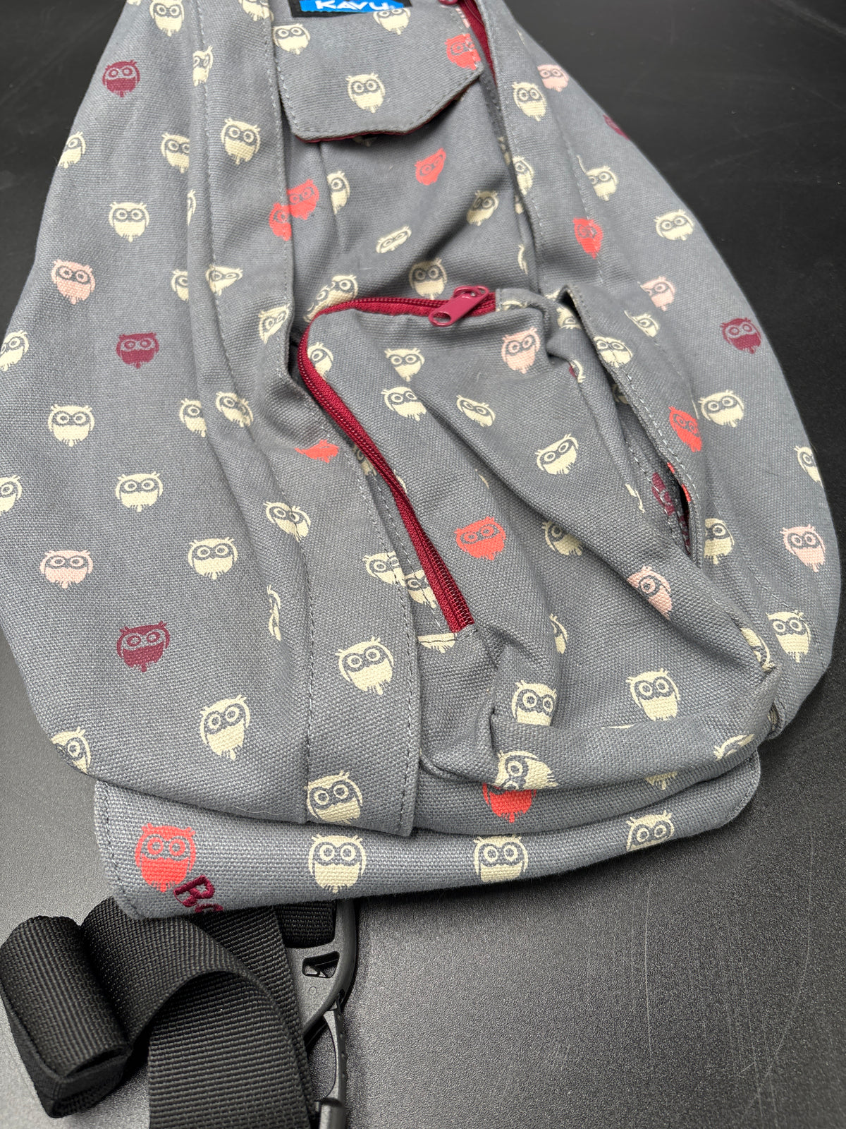 KAVU RETIRED OWL Print crossbody bag New with no Tags features owl print design and adjustable strap for practical use.