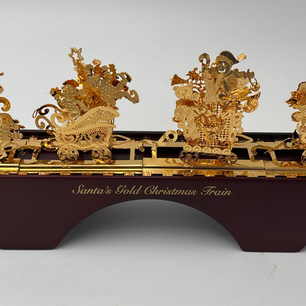 The Danbury Mint Santa’s Gold Christmas Train in Box