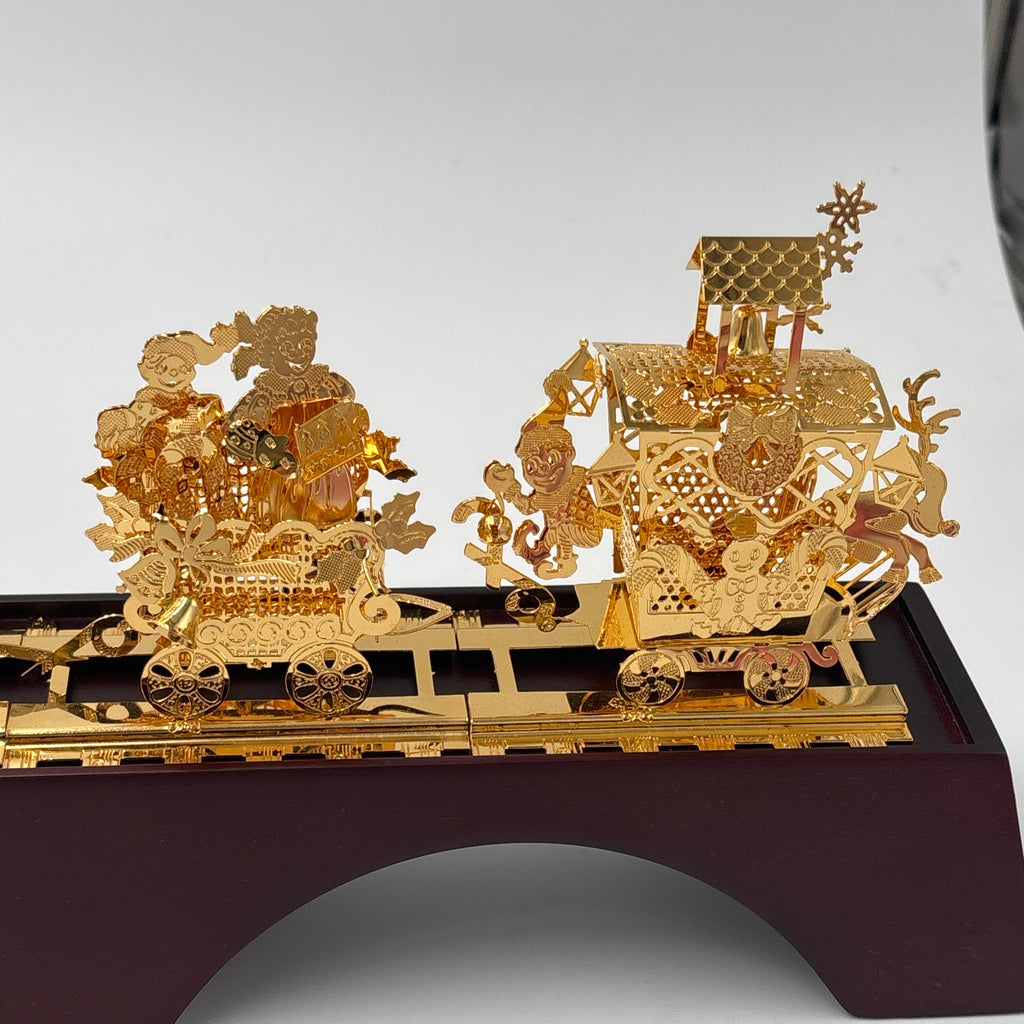 The Danbury Mint Santa’s Gold Christmas Train in Box