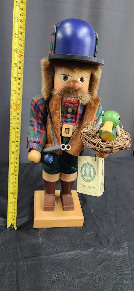 Christian Ulbricht Duck Hunter Nutcracker, model 0/293. This is a limited edition piece, numbered 704 of only 2,500 made-04 ruler