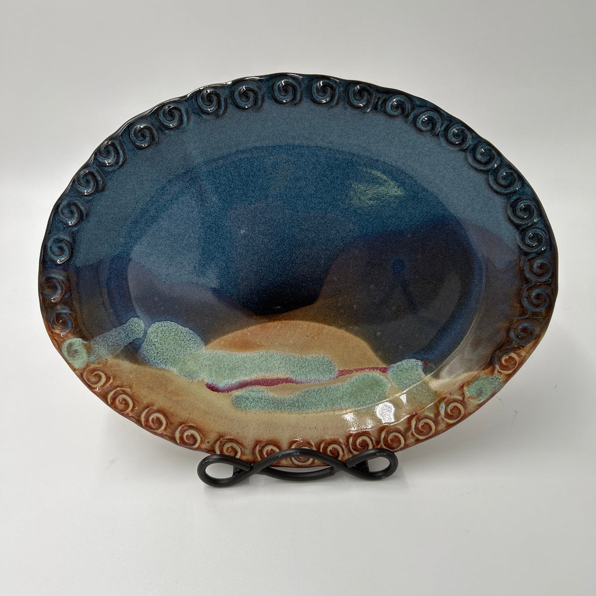 Cady Clay Works Seagrove NC Handcrafted Pottery Oval Tray Dish Multi-Glaze with intricate scroll rim and colorful glaze.