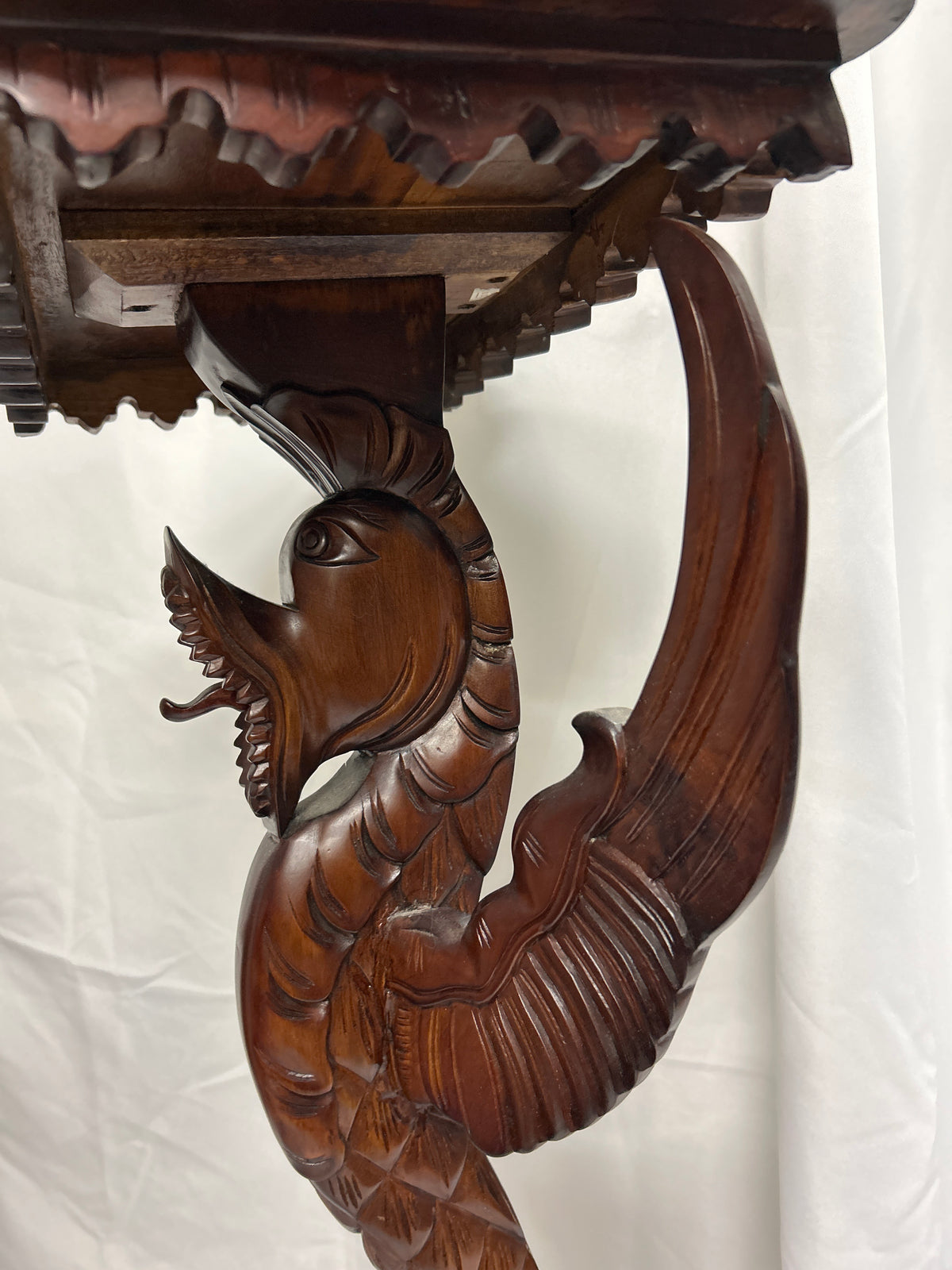 Carved Dragon Pedestal Table showcasing intricately carved dragon pedestal detail.