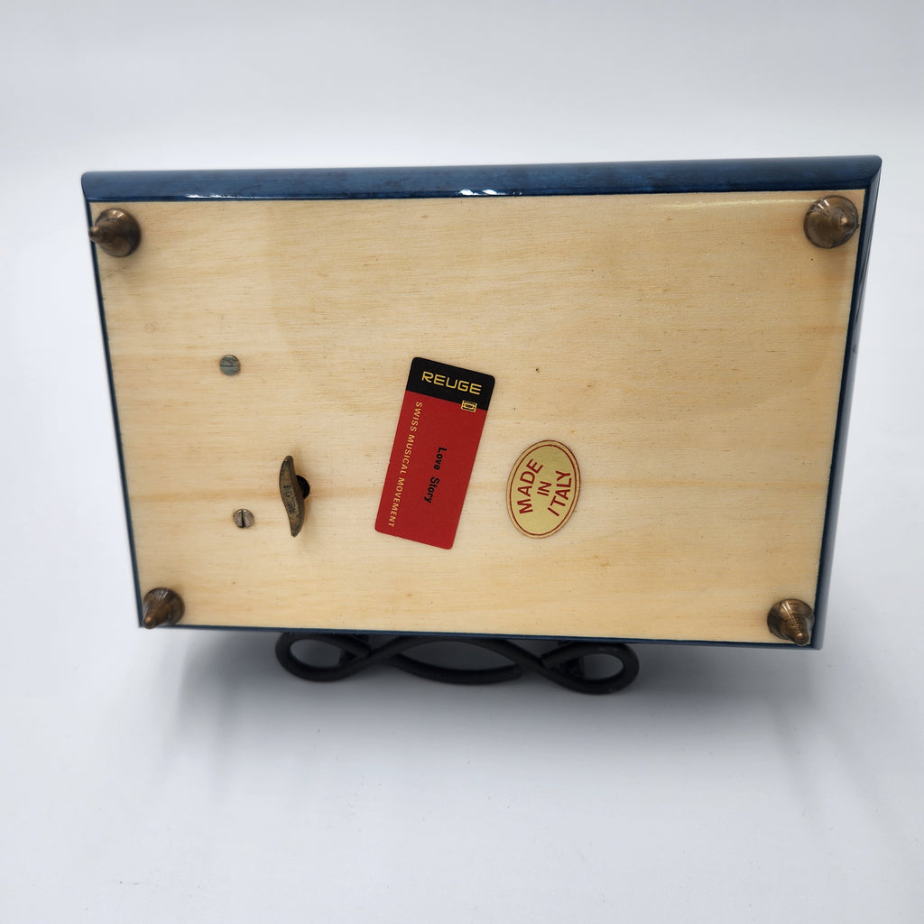 Reuge (Swiss Movement) / Italian Sorrento Music Box bottom view showcasing branding and craftsmanship details.