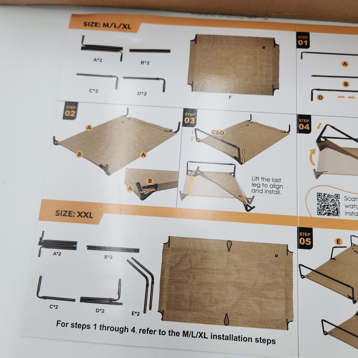A printed installation instruction sheet showing step-by-step assembly diagrams for a Veehoo elevated dog bed, with labeled parts.