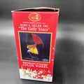 Vintage Santa's World 'The Early Years' color wheel toy box, showing the red packaging with a picture of the multi-colored spinning wheel and holiday illustrations at the bottom. Kurt Adler The Early Years Reproduction of the Nostalgic Color Wheel Light