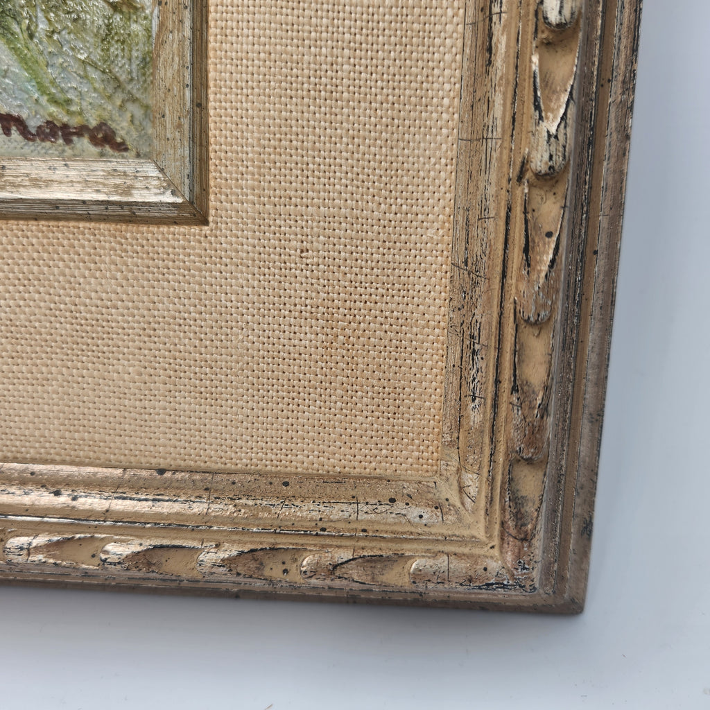 Close-up view of the vintage frame showcasing intricate details and texture, accentuating the oil canvas painting.