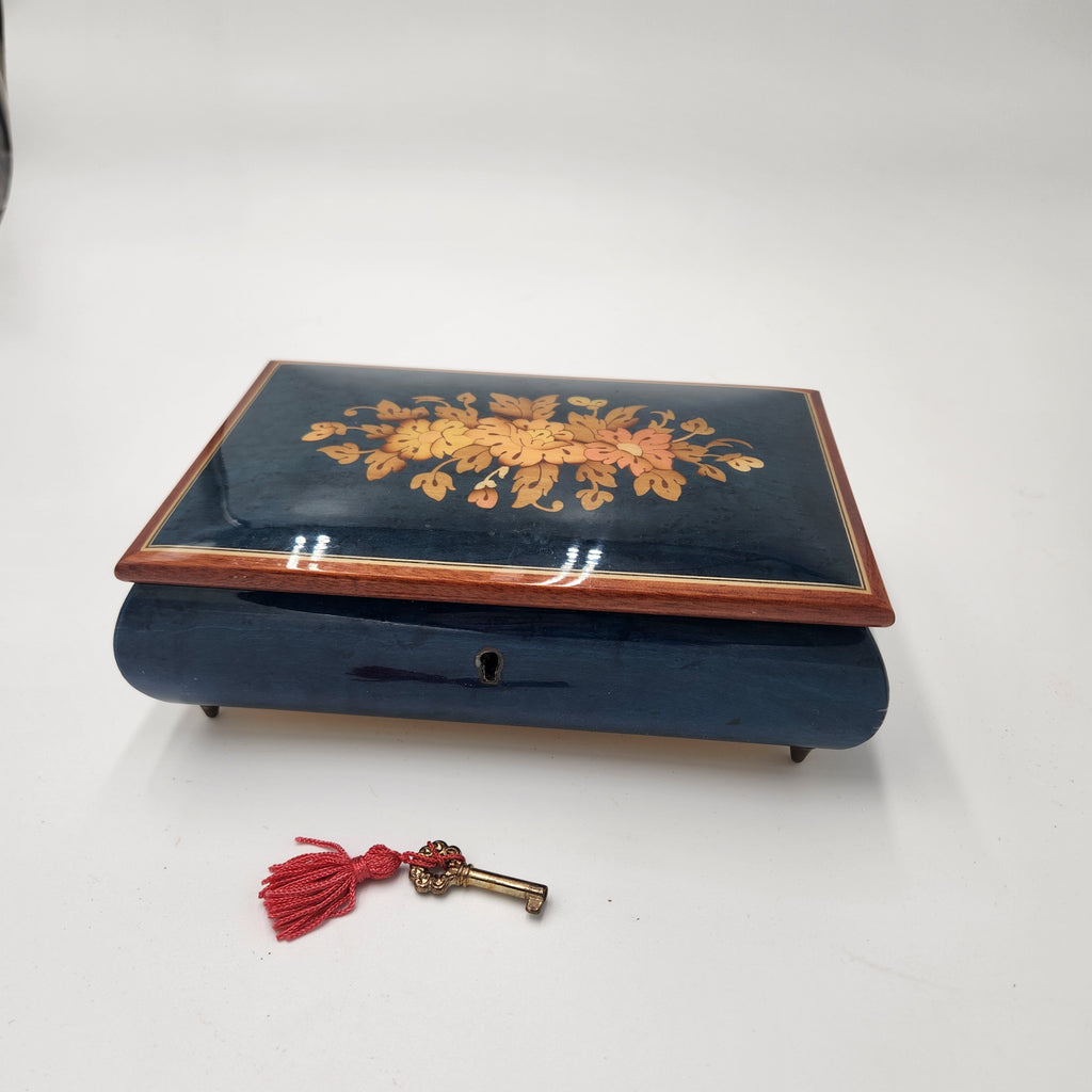 Reuge (Swiss Movement) / Italian Sorrento Music Box featuring an elegant floral design and a decorative key.