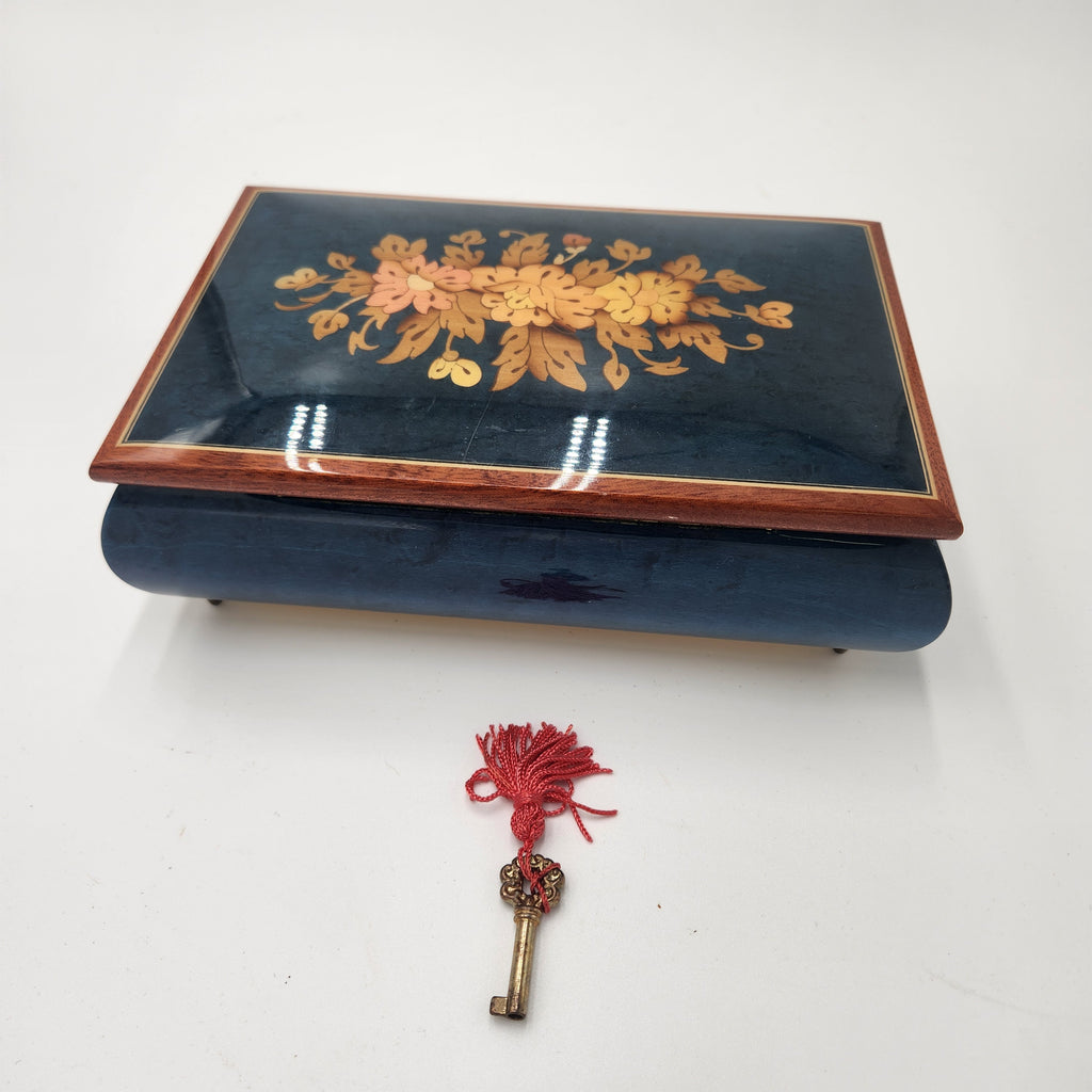Reuge (Swiss Movement) / Italian Sorrento Music Box featuring detailed floral inlay design and ornate key.
