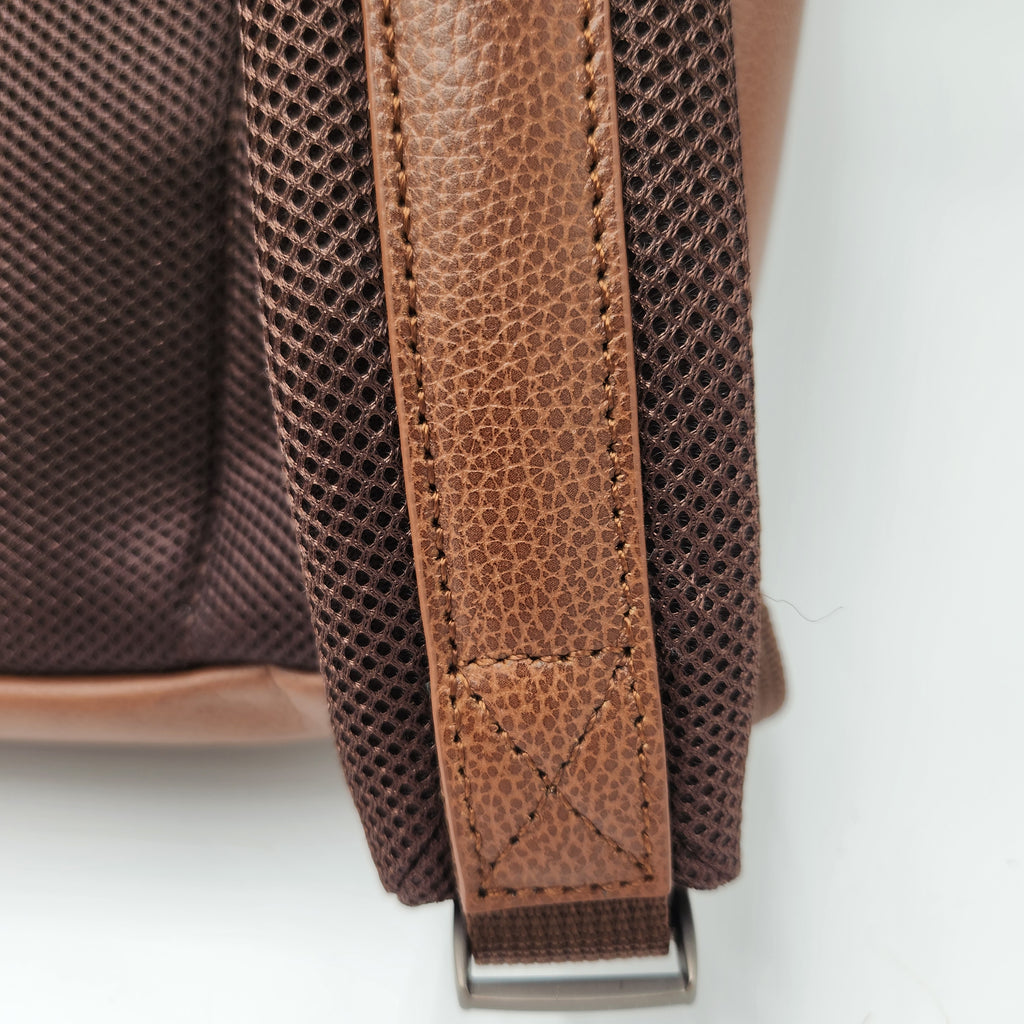 Close up of the leather details on Samsonite laptop carry backpack.