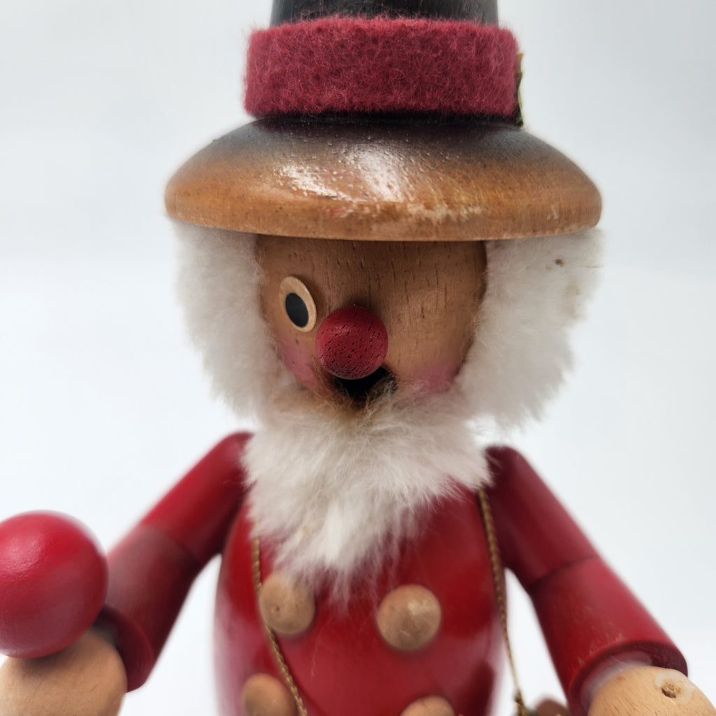 Vintage German Wood Smoker Erzgebirge Handcrafted festive figure with a red coat and hat, intricately detailed craftsmanship.