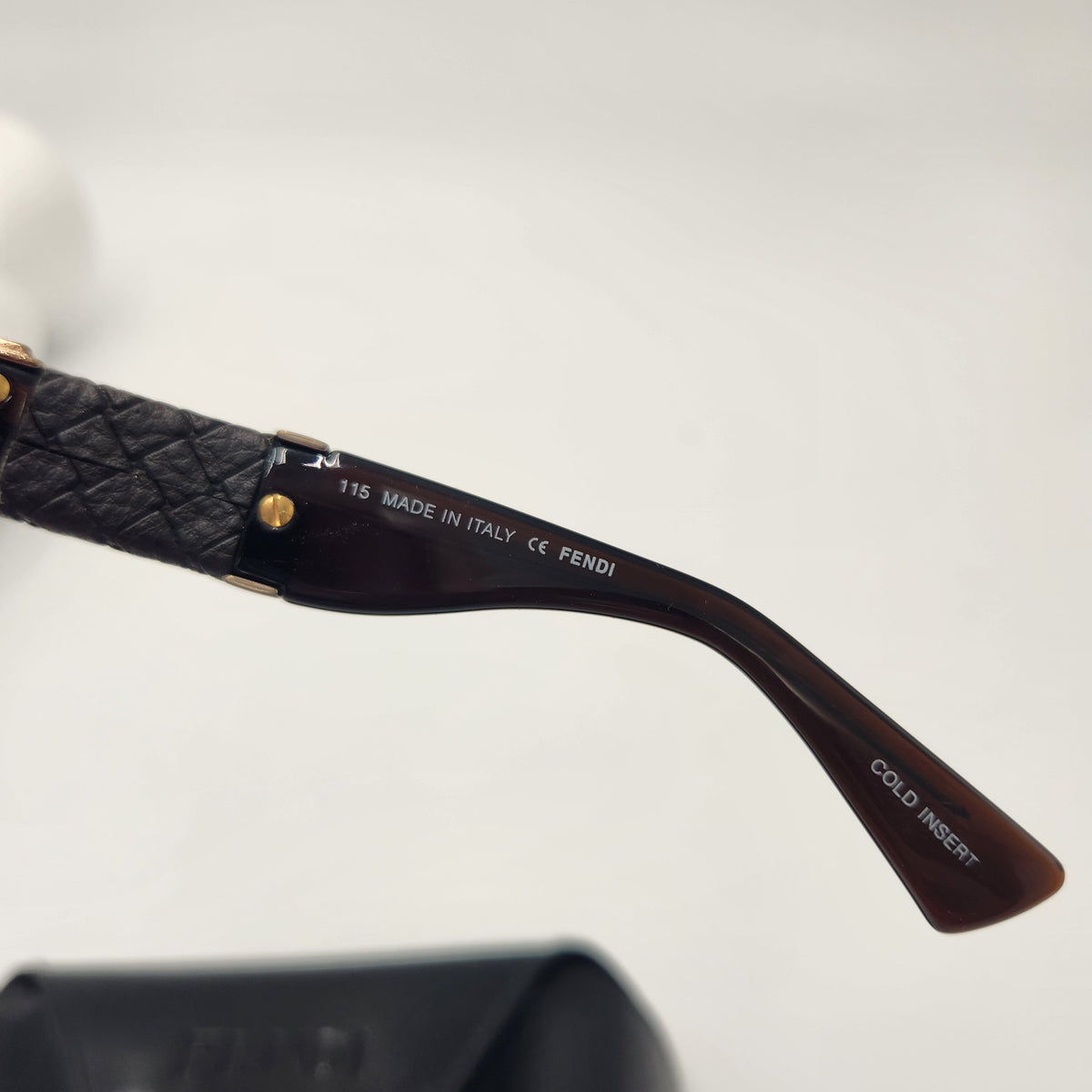 Fendi sunglasses shows text