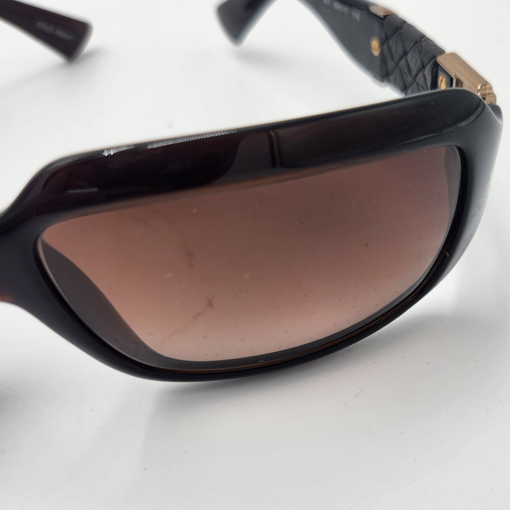 Fendi sunglasses close lens