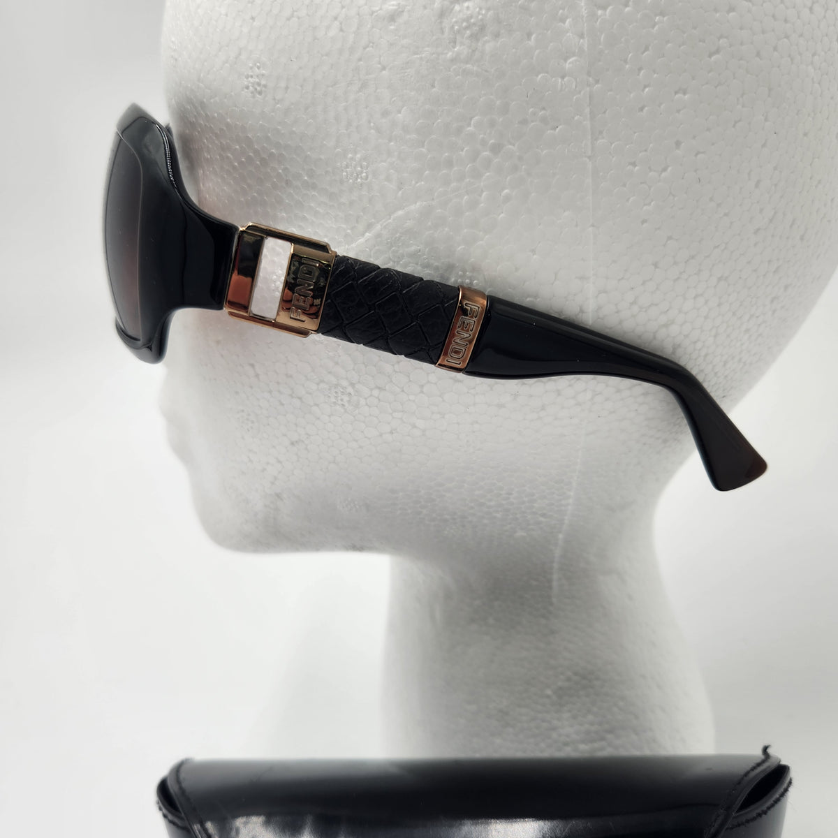 Fendi sunglasses left side with case