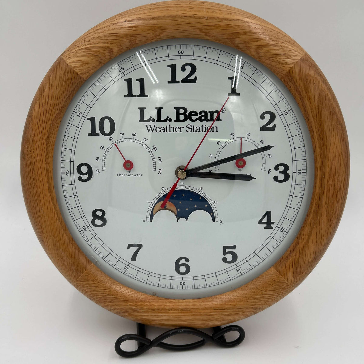 Vintage LL Bean Weather Station Wall Clock in solid oak frame with thermometer and hygrometer.